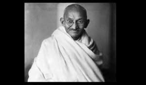 1200px-Mahatma-Gandhi,_studio,_1931